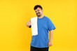 © Atlas - A fat man is tired after training, on a yellow background.