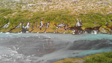 Poster - Aerial view of Beautiful blue river and rock formations at Barnafoss waterfalls in Western Iceland