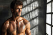 © evannovostro - Young topless handsome sporty man. Strong athletic fitness model showing his torso in natural day light