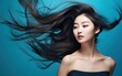 Portrait closeup of beautiful young female asian woman shaking her beautiful hair in motion. Beauty long hair and advertising shampoo concept.