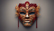 Handgemachte menschliche Maske. Hauptfarben: gold und rot.