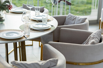 Beautiful served table in a restaurant in light colors