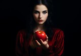 Fototapeta Mapy - Harvest Bounty: A Lady Holding a Ripe Apple with Freshness, Orchard Delight: Woman Enjoying a Ripe Apple from the Harvest, Garden Elegance: Lady with a Ripe Apple Embracing Nature's Bounty.