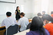 © EduLife Photos - Asian female university explaining lesson to the students in the classroom