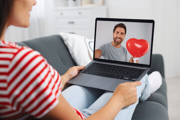 Sticker - Long distance love. Woman having video chat with her boyfriend via laptop at home, closeup