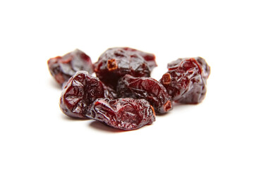 Wall Mural - Dried cranberries isolated on white background. Sweet red berries closeup