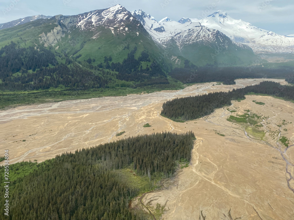 Red River flowing from Red Glacier on Mount Iliamna Volcano in Lake ...