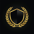© blessed.grapix - Black glass shield with golden frame, golden laurel wreath