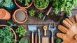 A gardening flat lay with a variety of potted plants gardening tools seeds and gloves spread out on an earthy wooden surface.