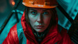 © aimired - Professional Female construction worker looking intensely into the camera in blue and red contrast lighting