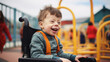 Autistic spectrum disorder child smiles with wheelchair on the playground