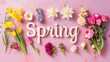 vibrant display of spring flowers surrounding wooden letters that spell out the word Spring