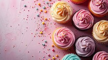 Birthday Cupcakes On A Pink Background With Space For Text