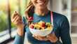 © Your Hand Please - female athlete enjoys a vibrant fruit salad, embodying health, wellness, and the joy of nourishing her body with wholesome nutrition