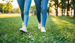 two girls walking barefoot in the park, symbolizing friendship, nature connection, and a carefree lifestyle