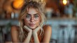  face of smiling beautiful blonde a woman in glasses , looking directly