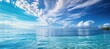 © RocknRoller Studios - Peaceful Tropical Seascape with Turquoise Waters and Blue Skies. Summer Ocean Panorama with White Fluffy Clouds.