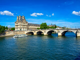 Fototapeta Paryż - Seine river and Pont Royal (Royal bridge) in Paris, France. Cityscape of Paris. Architecture and landmarks of Paris.