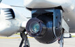 Camera pod under a surveillance aircraft.