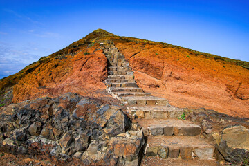 Wall Mural - Stone stairs on the trail to the Ponta de São Lourenço (tip of St Lawrence) at the easternmost point of Madeira island (Portugal) in the Atlantic Ocean