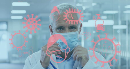 Sticker - Image of covid-19 icons floating with scientist wearing face masks