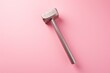© Alex - Minimal Style Hammer on Pink Background AI Generated