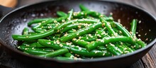 Green Beans And Sesame Seeds Cooked In A Frying Pan.