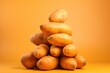 Vibrant Orange Sweet Potatoes on Orange Background AI Generated