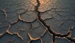 Cracks on the ground due to drought create repeating details