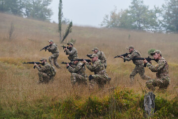 A disciplined and specialized military unit, donned in camouflage, strategically patrolling and maintaining control in a high-stakes environment, showcasing their precision, unity, and readiness for