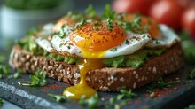 Avocado Toast With Poached Egg, A Trendy And Healthy Breakfast Option Featuring Perfectly Poached Eggs On Avocado Toast