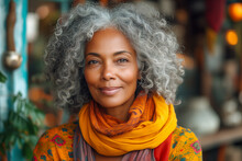 High Quality Portrait Beautiful Multiracial Senior Woman With Gray Hair In Bright Orange Scarf.