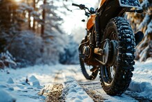 Rear View Of An Orange Motorcycle Standing In A Rut On A Snowy Forest Path On A Winter Cloudy Day
