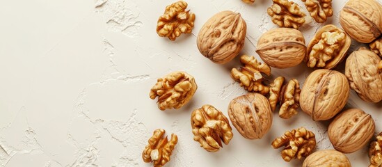 Wall Mural - Crunchy Walnuts Lie Serenely on a Light-Colored Background, Bringing a Captivating Flair to the Image