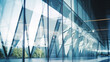 © Artinun - Blurred glass wall of modern business office building at the business center use for background in business concept. Blur corporate business office. Abstract office windows background.