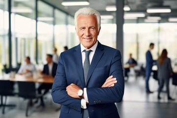 Wall Mural - A distinguished senior businessman consultant smiling warmly while gazing at the camera in a modern office setting