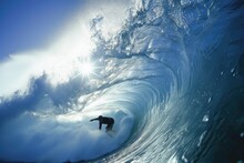 Riding The Curl: A Thrilling Shot Of A Surfer In The Barrel Wave