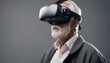 portrait of a grey haired old man wearing virtual reality glasses, isolated grey background


