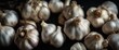 Whole Garlic Bulbs, several garlic bulbs with their papery skins, set against a dark