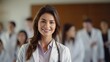 © LaxmiOwl - Capturing the essence of confidence and professionalism, a female doctor or nurse stands in the front row of a medical training class or seminar room, smiling cheerfully, with ample copy space