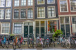 Parked Bicycles in Front of the Facades of a Townhouses in Amsterdam