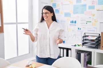 Sticker - Young beautiful hispanic woman business worker smiling confident speaking at office