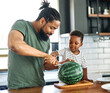 © Lumos sp - child family kitchen food boy son father watermelon fruit slice summer organic meal fun preparing healthy diet eating home black