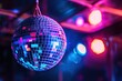 © Alina - Colorful disco ball party on blurred lights background