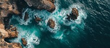 Captivating Aerial View Of A Wild And Rocky Place With Soothing Se Waves