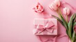 Elegant Pink Gift Box with Ribbon and Tulip Bouquet Top View for Mother's Day Celebration