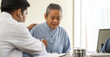 © Art_Photo - Asian man doctor service help support discussing and consulting talk to asian sick senior man patient at meeting health medical care trust concept in hospital.healthcare and medicine