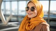 Happy muslim woman in stylish hijab. modern, colorful and trendy fashion photoshoot