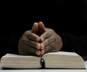  people praying to god with black background stock image stock photo