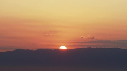 Wall Mural - Time-lapse of Beautiful morning scenery with Misty Mountain Morning Landscape with Fog and a Beautiful Sunrise